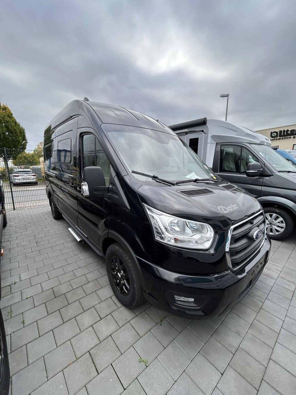 Wohnmobil Karmann Dexter 4x4 DE 560 AW mit 4 Sitzen bei Reisemobile-MKK GmbH Wohnmobil Ford Transit Karmann DE 560 AW Dexter 4x4 mit 4 Sitzen und 2 Schlafplätzen