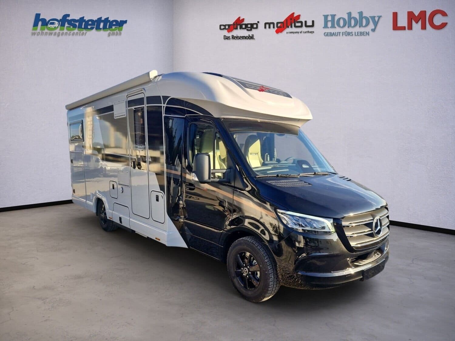 Wohnmobil Carthago chic c-line T 4.9 LE mit 4 Sitzen bei Wohnwagencenter Hofstetter GmbH Wohnmobil Carthago 4.9 LE chic c-line T mit 4 Sitzen und 3 Schlafplätzen