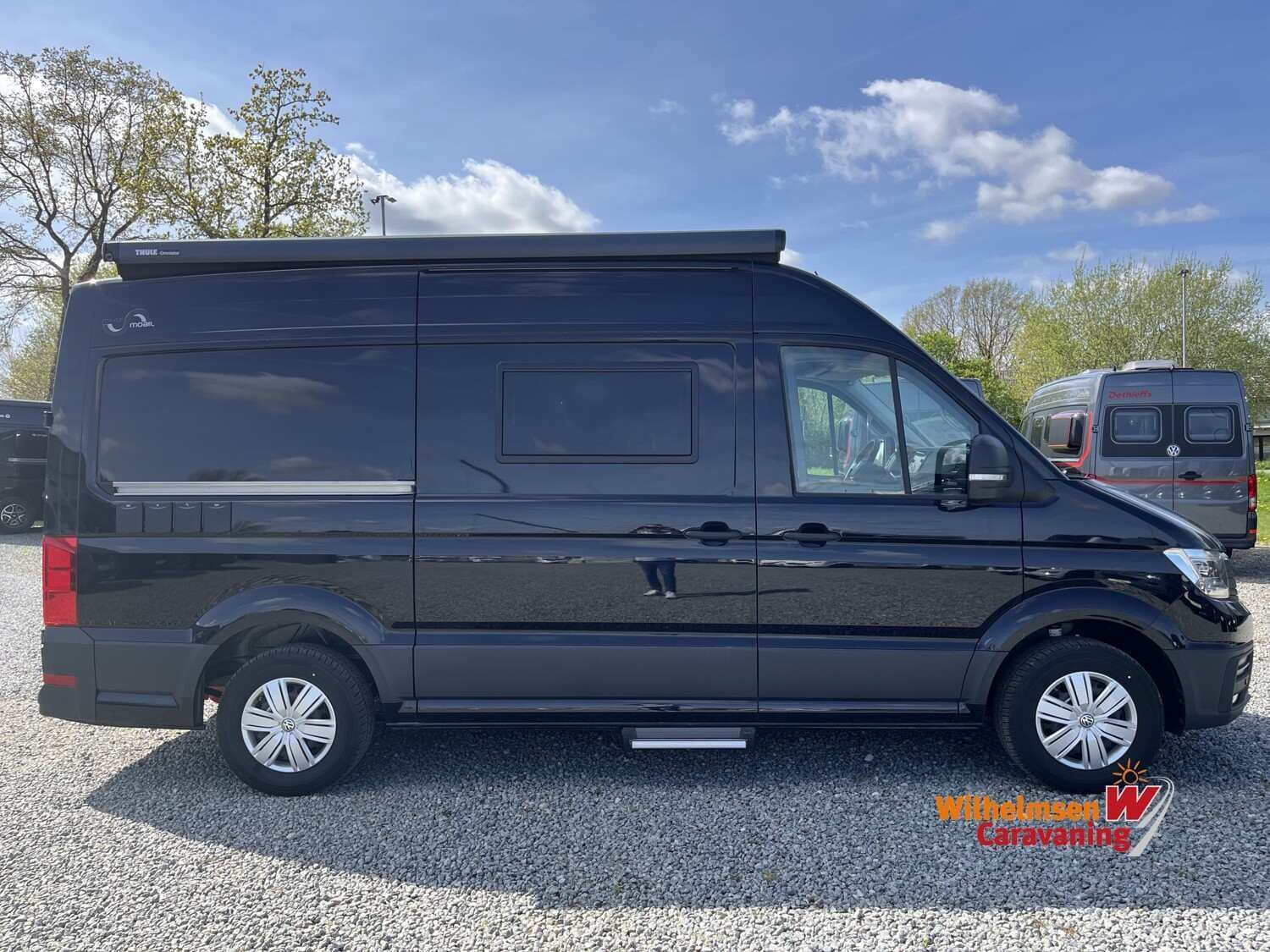 Wohnmobil Megamobil Mega Lounge 600 VW mit 2 Sitzen bei Wilhelmsen Caravaning GmbH Wohnmobil VW Crafter Megamobil VW Mega Lounge 600 mit 2 Sitzen und 2 Schlafplätzen