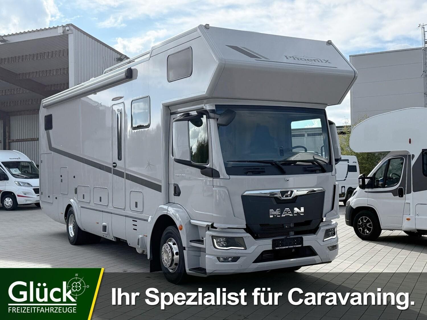 Wohnmobil PhoeniX Alkoven 10.000 BMASX mit 4 Sitzen bei Glück Freizeit GmbH Wohnmobil PhoeniX 10.000 BMASX Alkoven mit 4 Sitzen und 4 Schlafplätzen