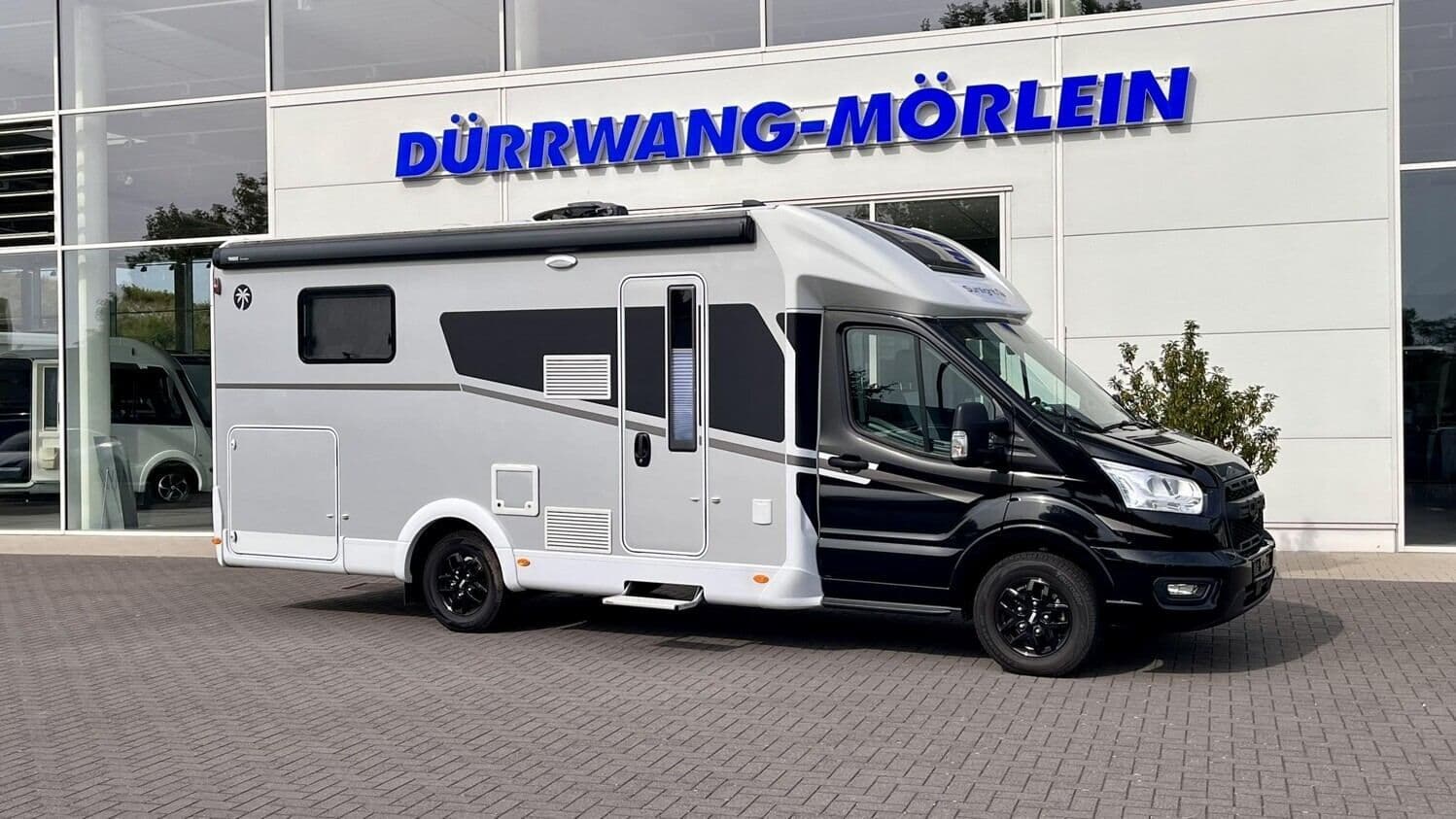 Wohnmobil Sunlight Adventure T Ford 690L mit 4 Sitzen bei Dürrwang GmbH & Co. KG Caravan und Reisemobile Wohnmobil Ford Transit Sunlight 690L Adventure T Ford mit 4 Sitzen und 3 Schlafplätzen
