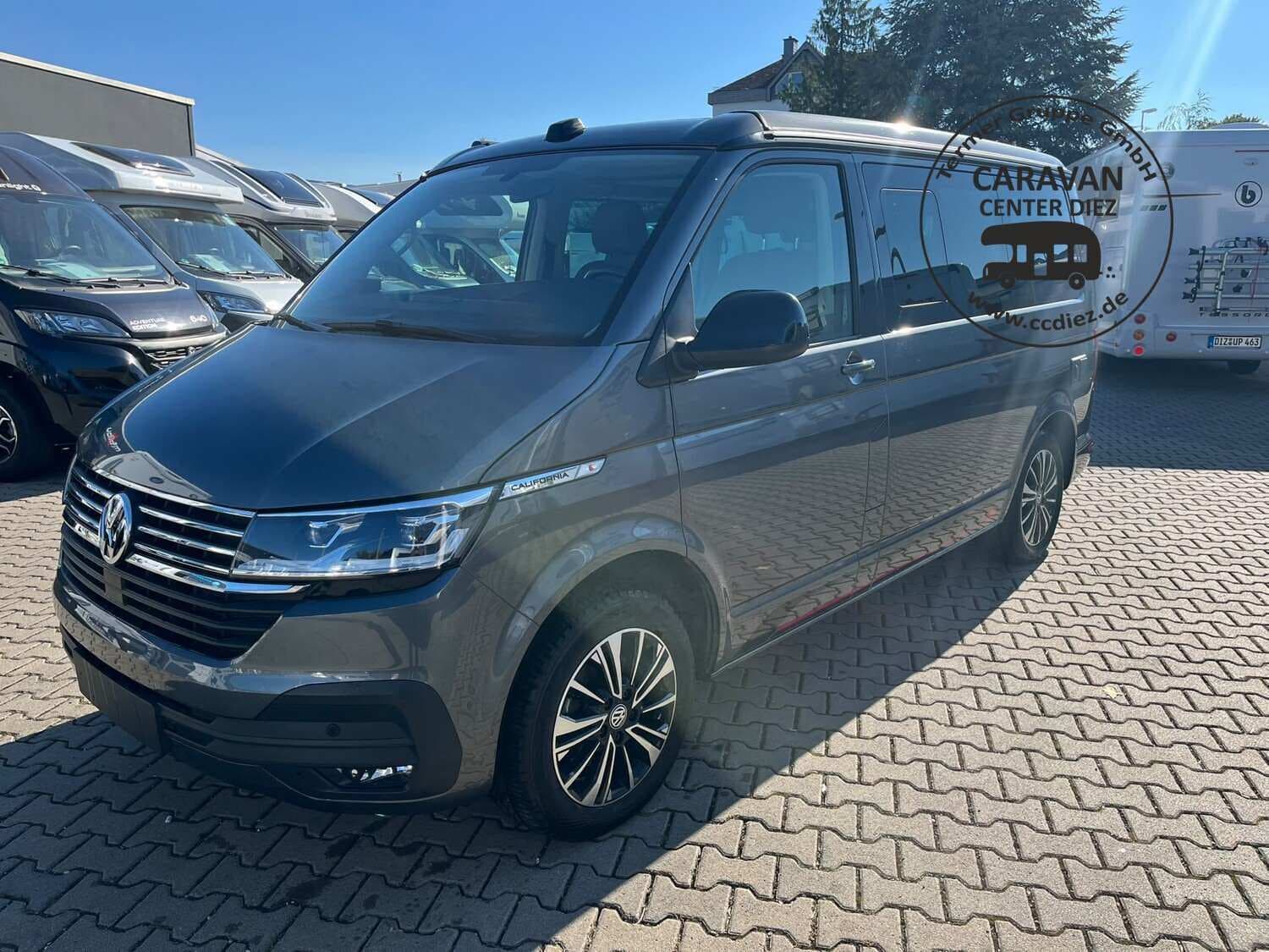 Wohnmobil Volkswagen California T6.1 Coast Edition mit 4 Sitzen bei Termer Gruppe GmbH Wohnmobil VW Multivan Volkswagen Coast Edition California T6.1 mit 4 Sitzen und 4 Schlafplätzen