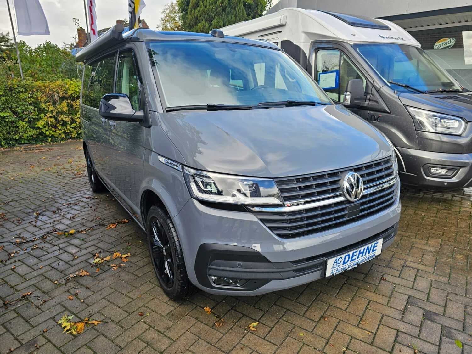 Wohnmobil Volkswagen California T6 Coast 4Motion mit 4 Sitzen bei A.C. Dehne GmbH Wohnmobil Volkswagen Coast 4Motion California T6 mit 4 Sitzen und 4 Schlafplätzen