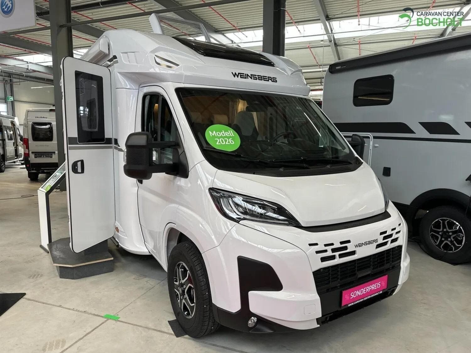 Wohnmobil Weinsberg CaraSuite 650 MEG mit 4 Sitzen bei Caravan Center Bocholt GmbH & Co. KG Wohnmobil Weinsberg 650 MEG CaraSuite mit 4 Sitzen und 2 Schlafplätzen
